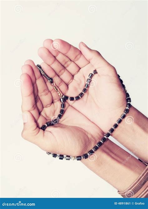 Hands With Muslim Prayer Beads Stock Image - Image: 4891861