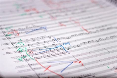 Premium Photo | Annotations by a conductor on a musical score