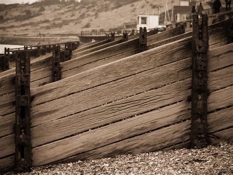 Wooden Fence | Wooden fence in a gravel beach leading to the… | Flickr
