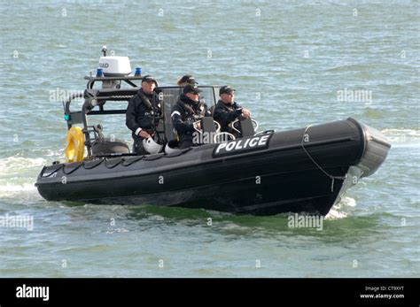 Portsmouth July 15th 2012. A police boat patrol providing maritime ...