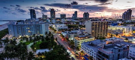 Aerial view of illuminated Ocean Drive and South beach, Miami, Florida, USA - Beach Park Hotel