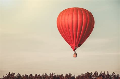 Premium Photo | Red balloon in the sky