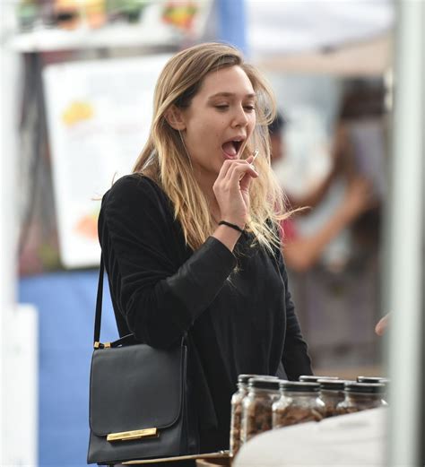 Elizabeth Olsen at a Farmer's Market in Los Angeles 10/16/ 2016 • CelebMafia