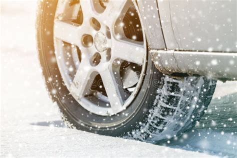 Close-up of Car Wheels Rubber Tires in Deep Winter Snow. Transportation ...