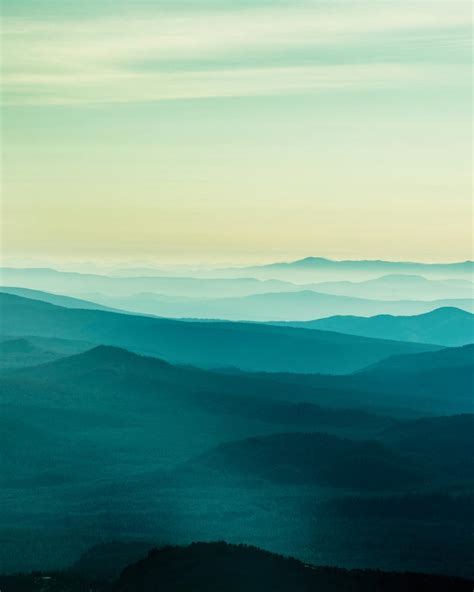 Silhouette of Mountains during Sunrise · Free Stock Photo