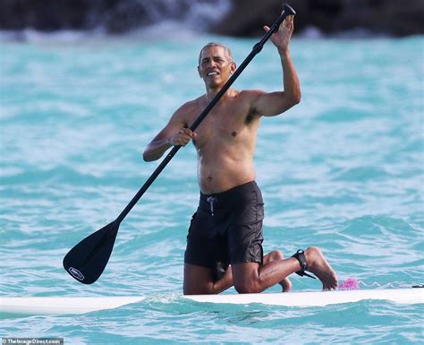 Shirtless Barack Obama is pictured paddleboarding in Hawaii | Daily ...