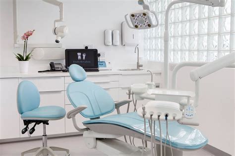 A-dec 300 dental chair with Cyan sewn upholstery. A-dec LED light ...