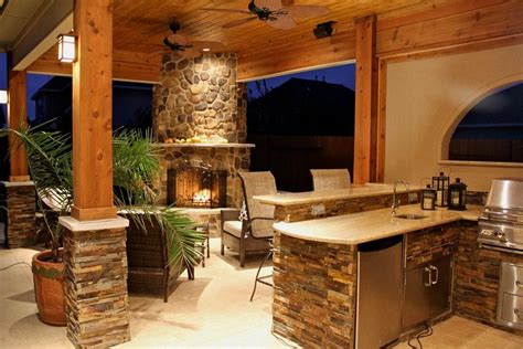 Rustic outdoor kitchen | Outdoor kitchen design, Rustic outdoor ...