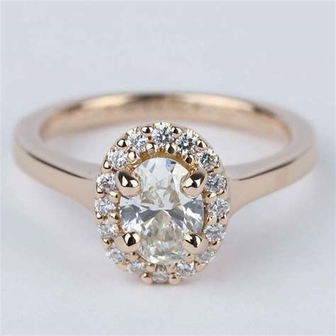 Pave Halo Oval Diamond Ring in Rose Gold (0.70 ct.)