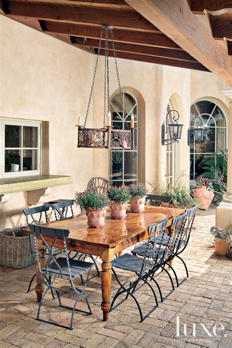 Mediterranean Outdoor Dining Area - Luxe Interiors + Design