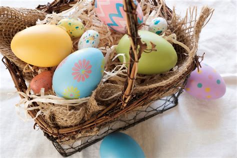 Colorfully decorated Easter eggs in a basket - StockFreedom - Premium Stock Photography