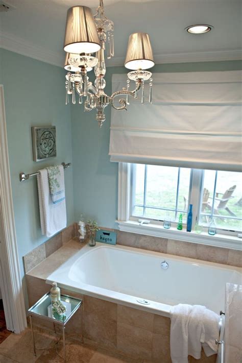 I love the bath tub next to the door, it is space effective and ...