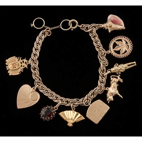 Gold-filled Charm Bracelet with Gold Charms | Cowan's Auction House: The Midwest's Most Trusted ...