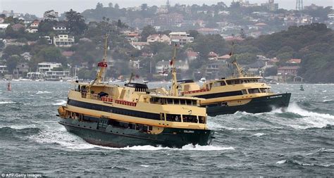 Stunning images show monster waves crashing into the Manly ferry ...