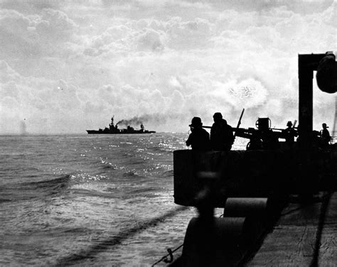 USS Augusta (CA-31) under fire from French battleship Jean Bart during ...