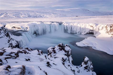 Godafoss Waterfall Frozen During Winter, Iceland Photograph by Ross Hoddinott / Naturepl.com ...