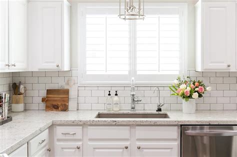 White Granite Kitchen Countertops with White Subway Tile Backsplash - Transitional - Kitchen ...