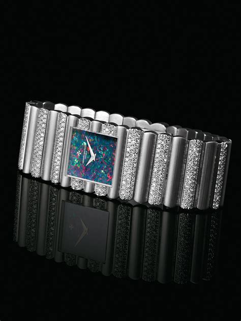 VACHERON CONSTANTIN. A VERY RARE AND HEAVY 18K WHITE GOLD AND DIAMOND-SET RECTANGULAR BRACELET ...