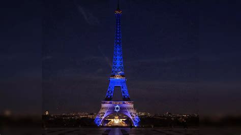 Eiffel Tower In Paris Lit Up To Show France's Support To Israel Amid ...