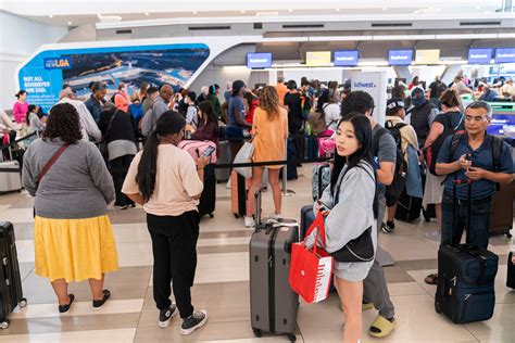 US airport chaos as nearly 9,000 flights cancelled or delayed ahead ...