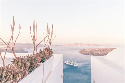 Premium Photo | Cruise ship near volcano on island of santorini