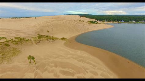 Epic Aerial Footage of The Beautiful Silver Lake Sand Dunes Shot in Ultra High Def 4K Quality ...