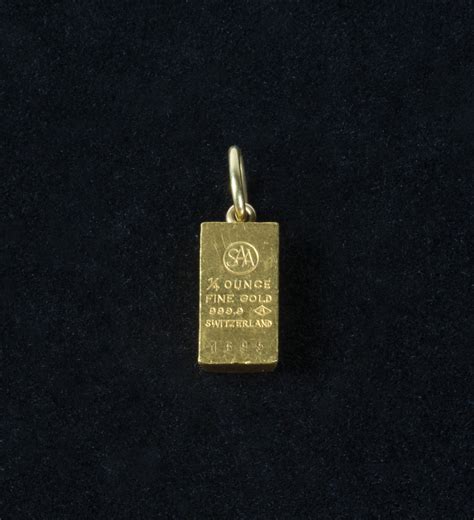 Lot 69F: Gold Ingot Pendant – Willis Henry Auctions, Inc.