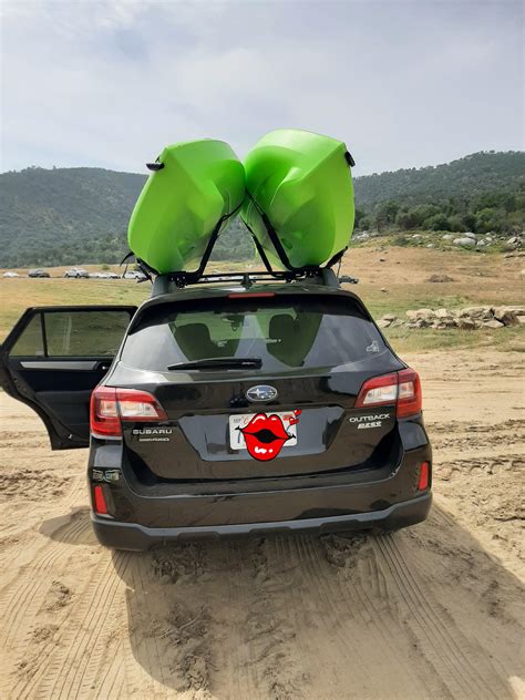 1st Subaru, 2017 Outback. And my first time loading our Yaks on a roof ...