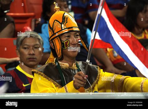 Thailand football fans cheering at Rajmalanga Stadium in Bangkok ...