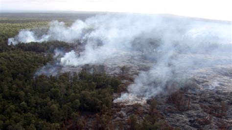 Hawaii lava flow continues slow move northeast