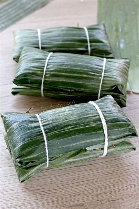 Suman sa Lihiya. With Latik and grated coconut or Latik sauce