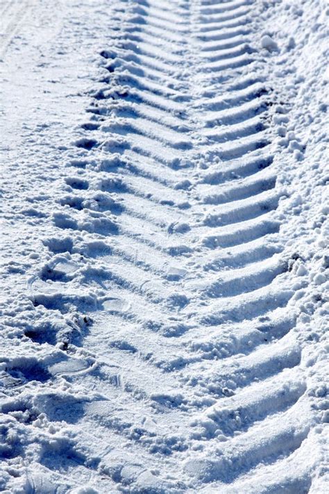 Tractor tracks in the snow stock image. Image of cool - 12334757