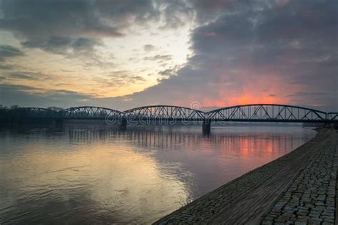 Bridge on the Vistula River Lit by the Setting Sun. Stock Photo - Image ...