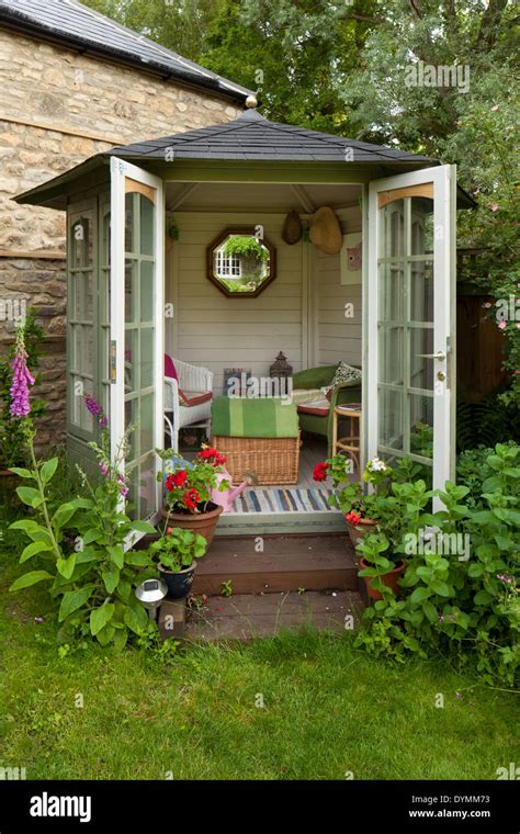 Small summerhouse in English garden Stock Photo: 68681735 - Alamy