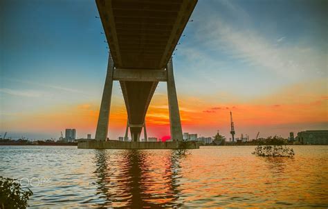 Under Phu My bridge by Bruce Lam on 500px | Bridge, Marina bay sands, Sunset