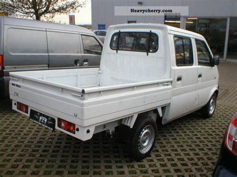 DFM Mini Truck flatbed truck crew cab 2009 Stake body Truck Photo and Specs