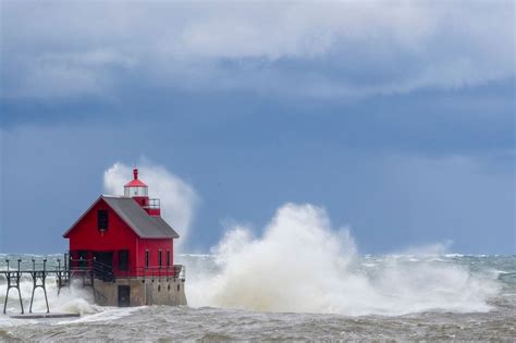 Lake Michigan waves exceeding 10 feet tall bash shoreline during storm - mlive.com