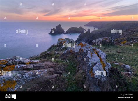 Kynance Cove at sunset Stock Photo - Alamy