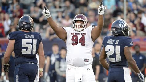 Fans storm field as New Mexico State wins first bowl game in 57 years ...