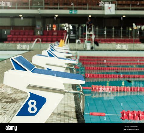 Olympic Swimming Pool starting blocks Stock Photo - Alamy