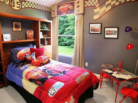 a bed room with a neatly made bed next to a book shelf filled with books