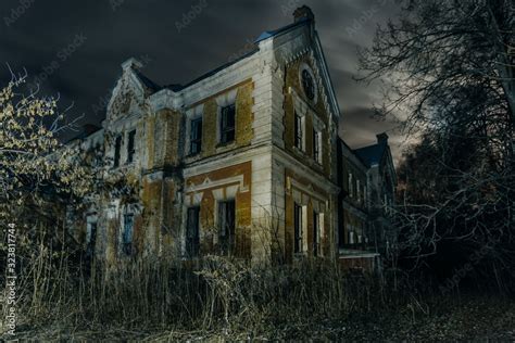 Dark and creepy old abandoned haunted mansion at night. Former Karl von Meck house Stock Photo ...