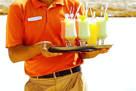 Waiter Serving Drinks, Cocktail on the Beach Stock Photo - Image of ...