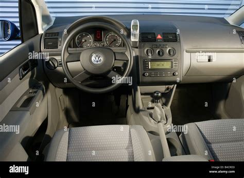 Car, VW Volkswagen Touran TDI, Van, model year 2003-, blue, interior ...