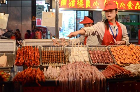 Chinese street cooking editorial stock image. Image of food - 34427674