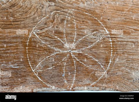 A witch mark (apotropaic mark) in a 16c Herefordshire house (UK). A protective sign in a daisy ...