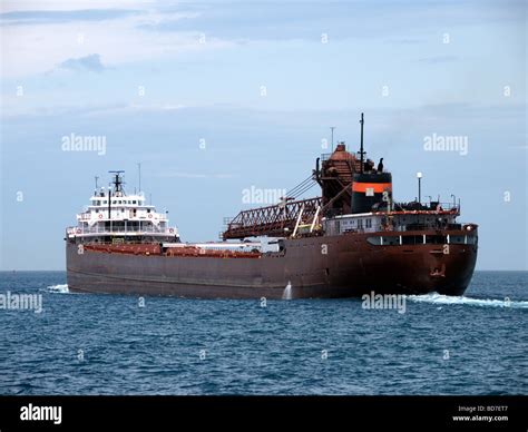 Lake freighter is headed into Lake Huron to pick up new cargo. You can see the bilge pumps ...