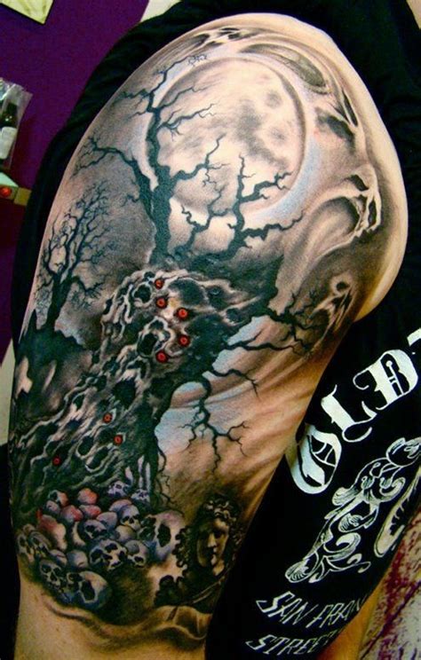 Horrible tree death tattoo on arm - Tattooimages.biz