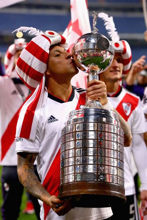 MADRID, SPAIN - DECEMBER 09: Enzo Perez of River Plate celebrates with the Copa Libertadores ...