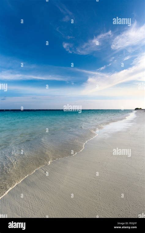 Tropical sunset near the island beach at Maldives Stock Photo - Alamy